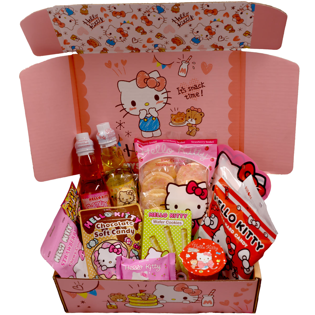 a top angle view of the Hello Kitty mystery snack crate showing all the Hello Kitty snacks inside the box.