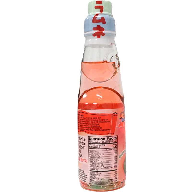 Bottle of pink soda with label and nutrition facts.
