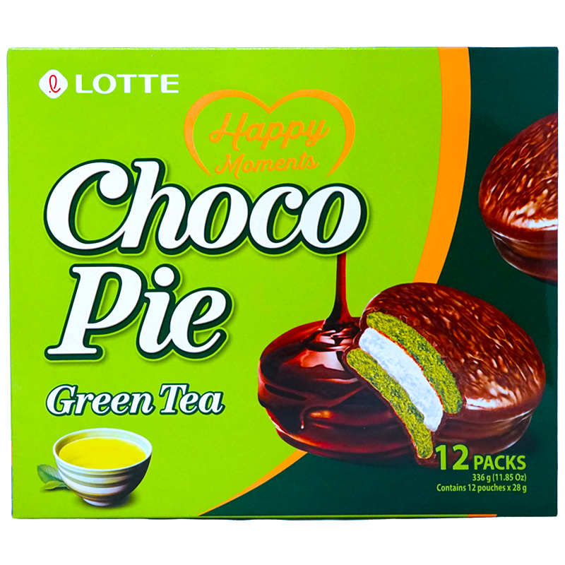 Front of package. The packaging is vibrant with a bright green background, showcasing the delicious Choco Pie with a green tea filling on the front. The image of the Choco Pie is surrounded by a splash of melted chocolate and a cup of green tea, hinting at the luscious flavor inside. The pack also emphasizes its 12-pack count, making it ideal for sharing or enjoying over time.